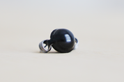 Metal ball wolf eliminator close up