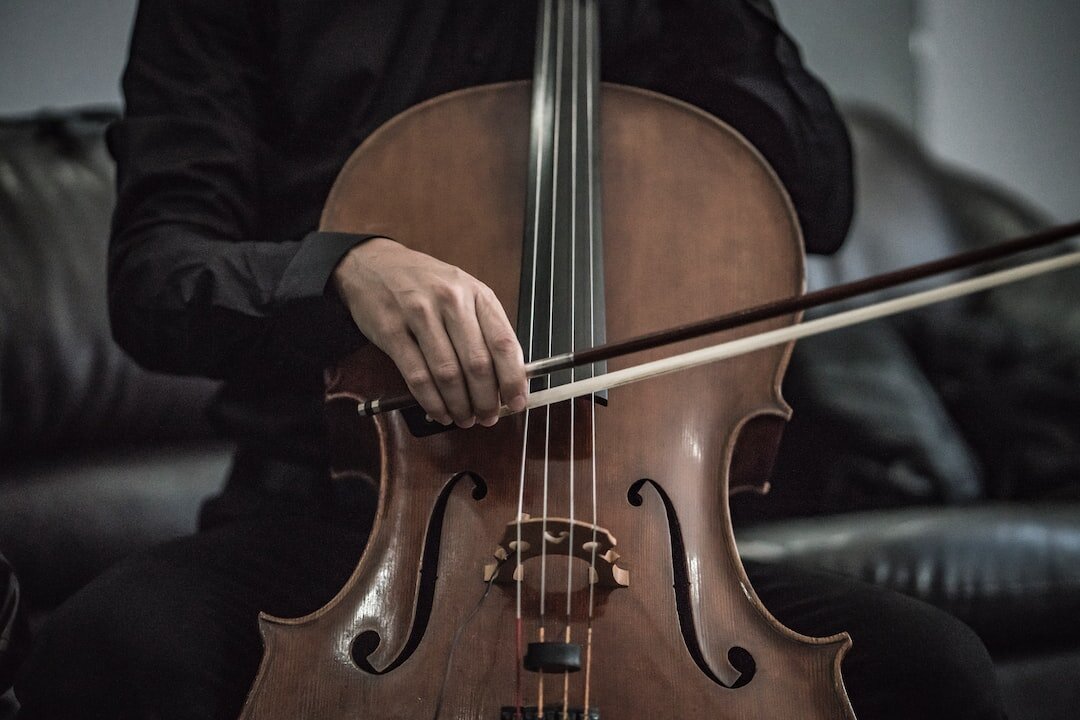 Cellist bowing a cello